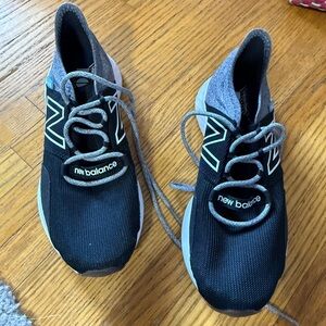 New Balance Kids Black and Gray Slip-On Sneakers with Mint Accent